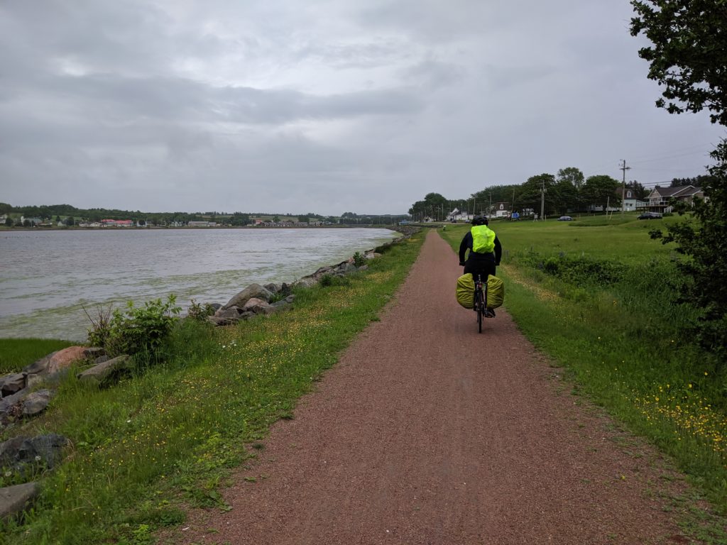 Chris biking off towards St. Peters and a rest!